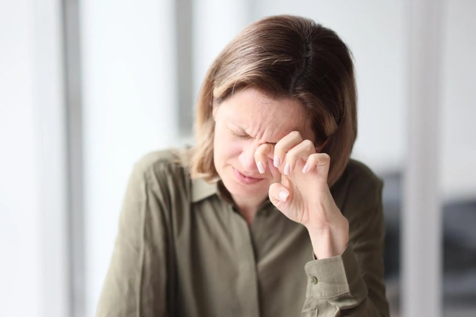 exhausted tired female manager sitting with her eyes closed her desk office concept-Austar-pharma